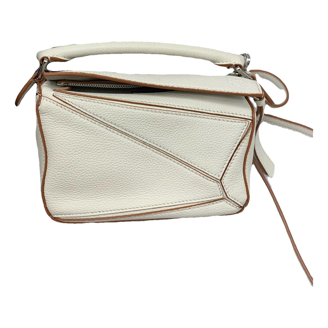 Puzzle leather handbag