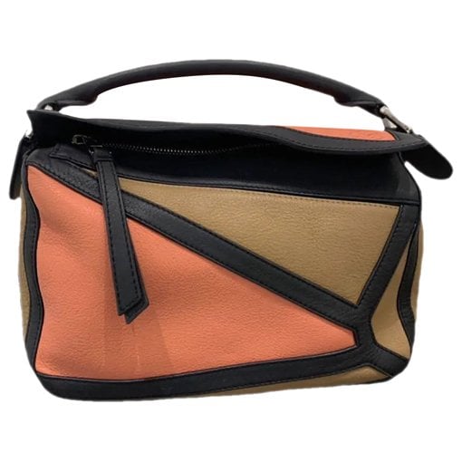 Puzzle leather crossbody bag