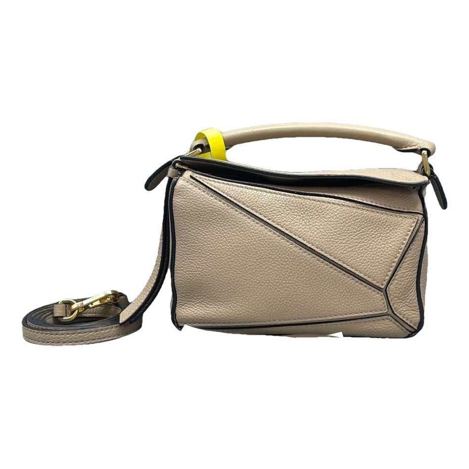 Puzzle leather handbag