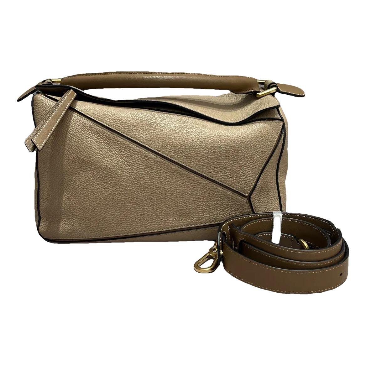Puzzle leather crossbody bag