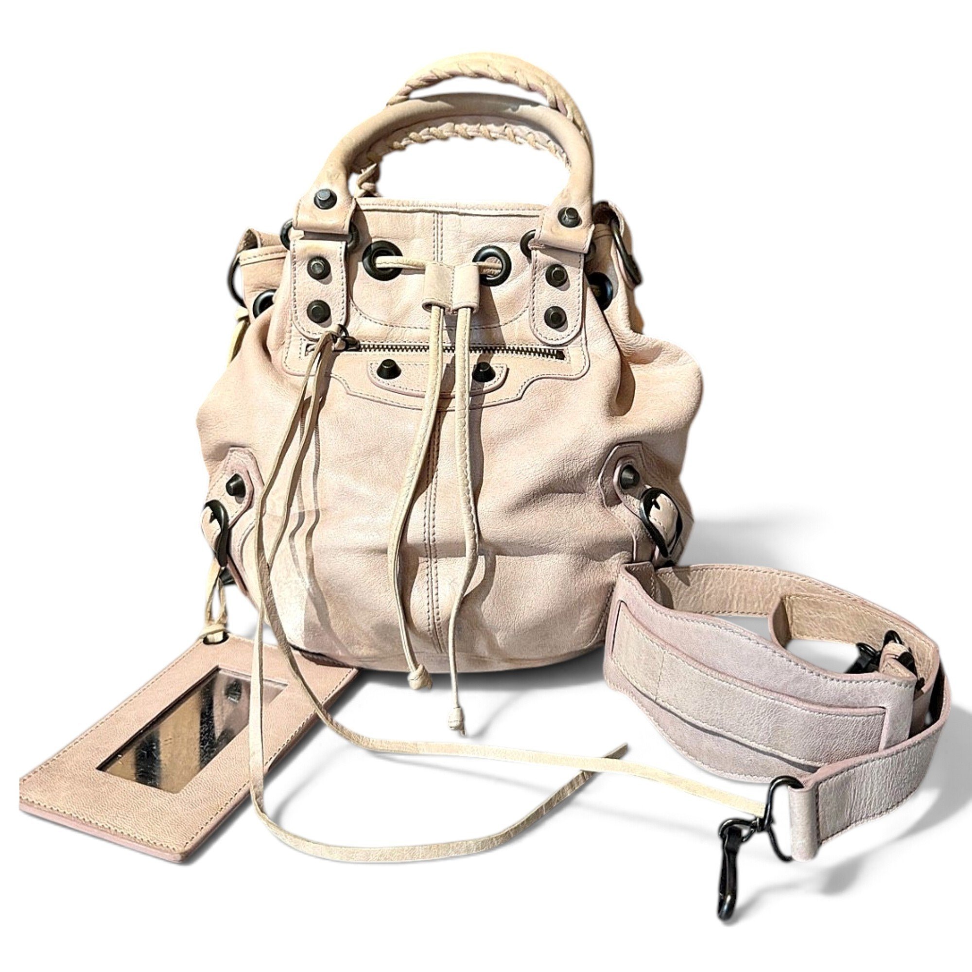 Pompon leather handbag