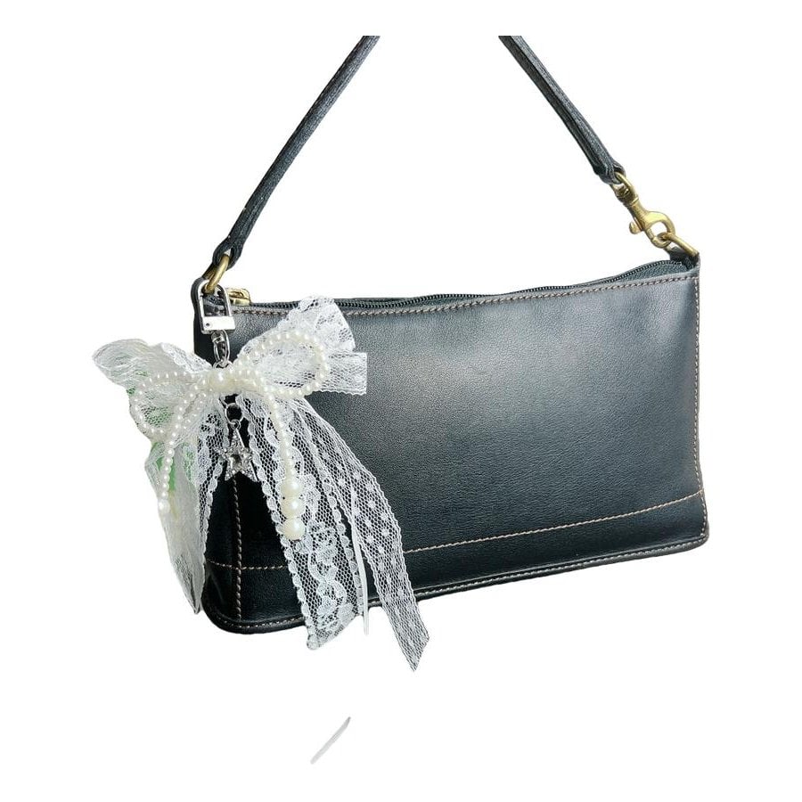 Signature Sufflette leather handbag