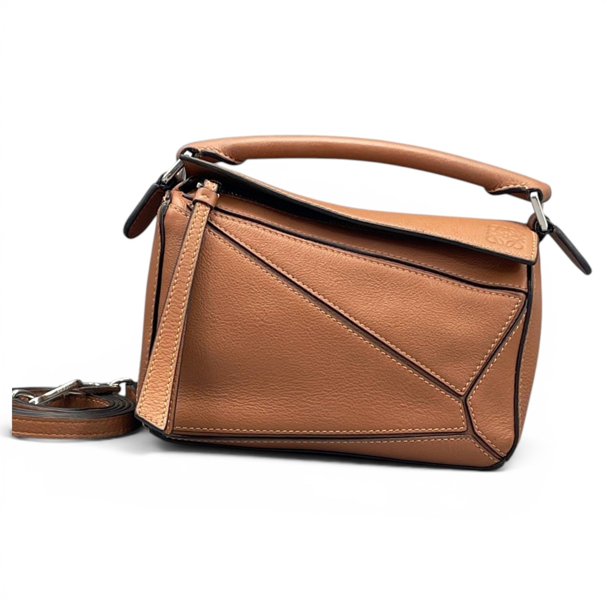 Puzzle leather handbag