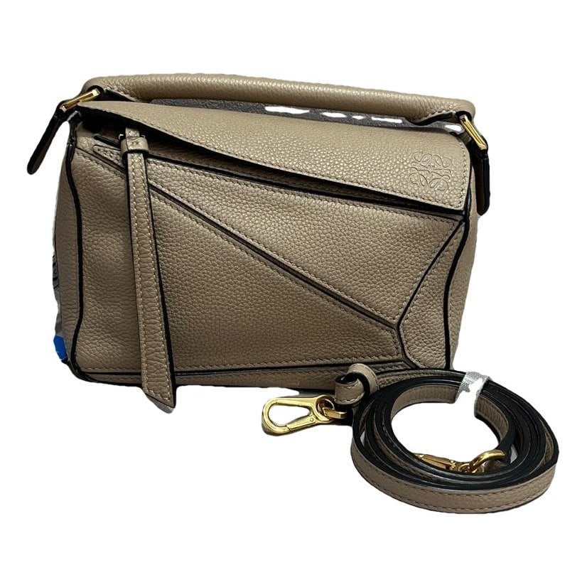 Puzzle leather handbag