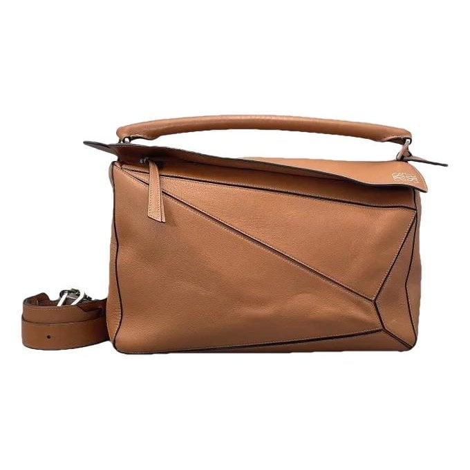 Puzzle leather handbag