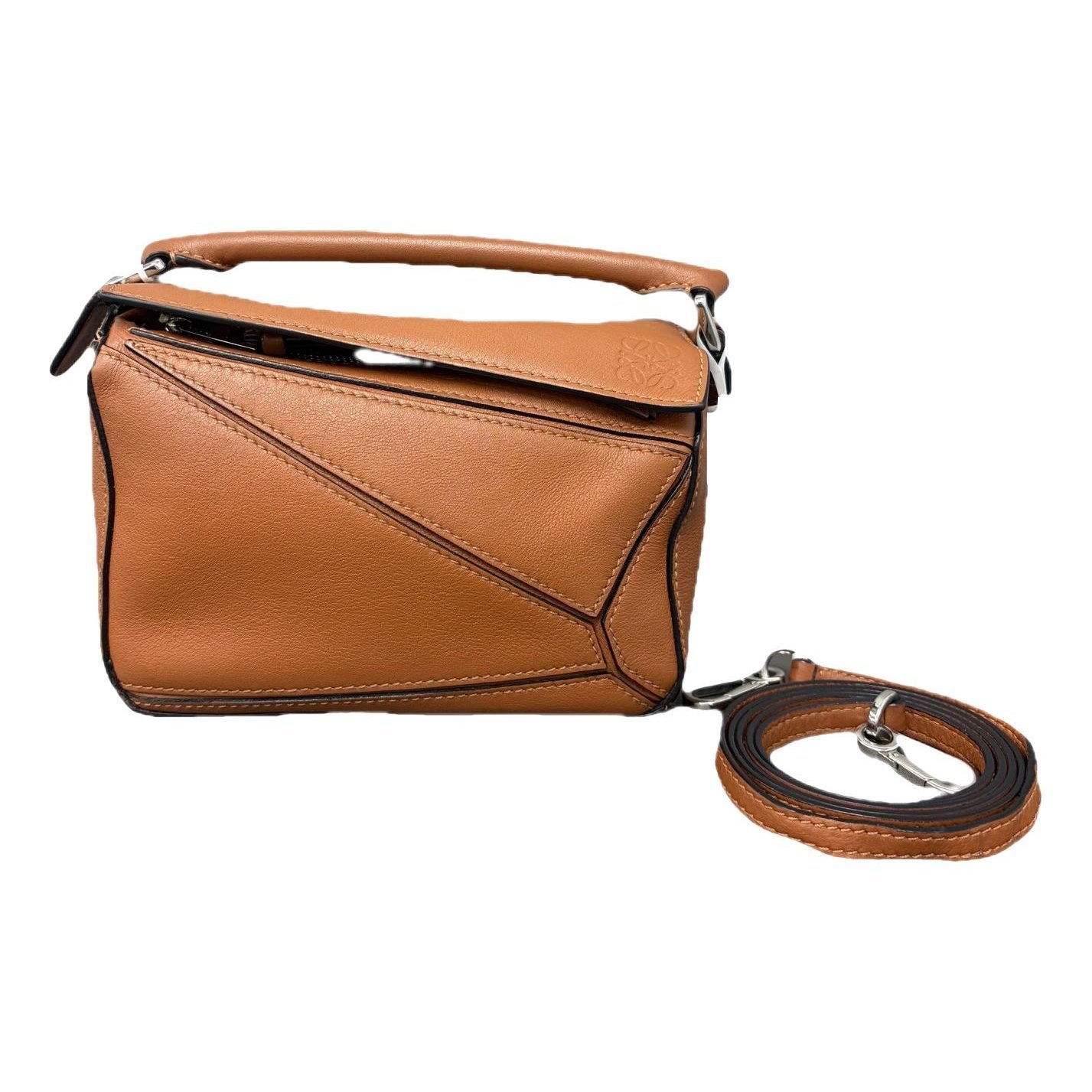 Puzzle leather handbag