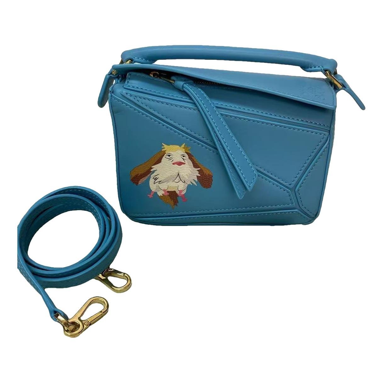 Puzzle leather handbag