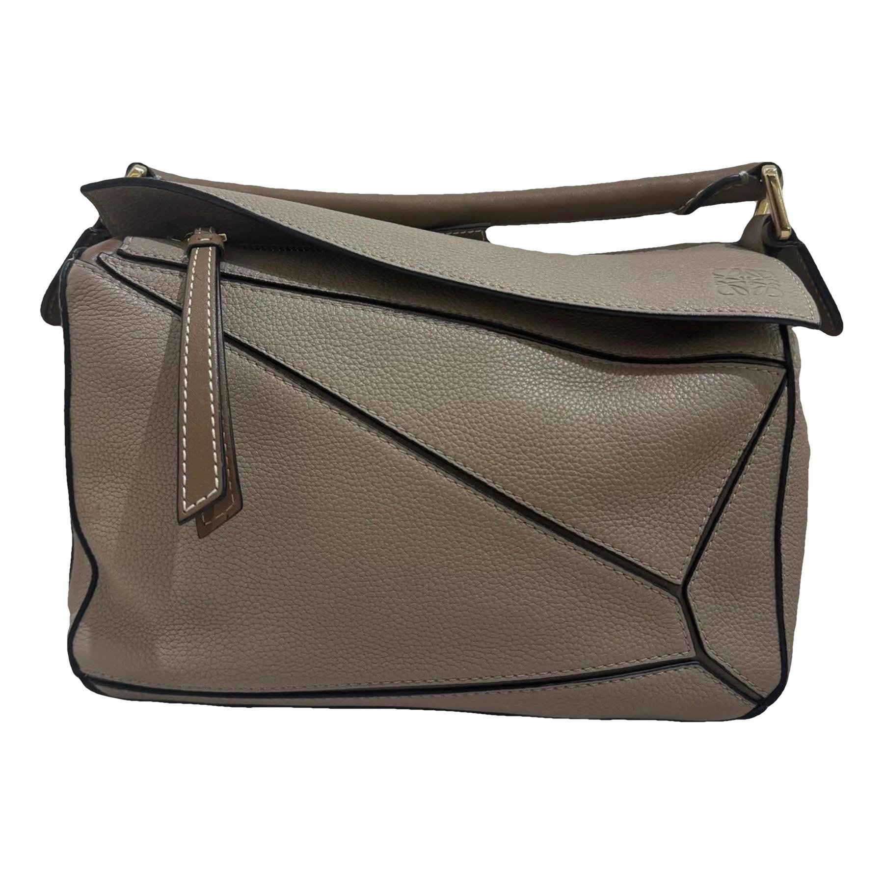 Puzzle leather handbag