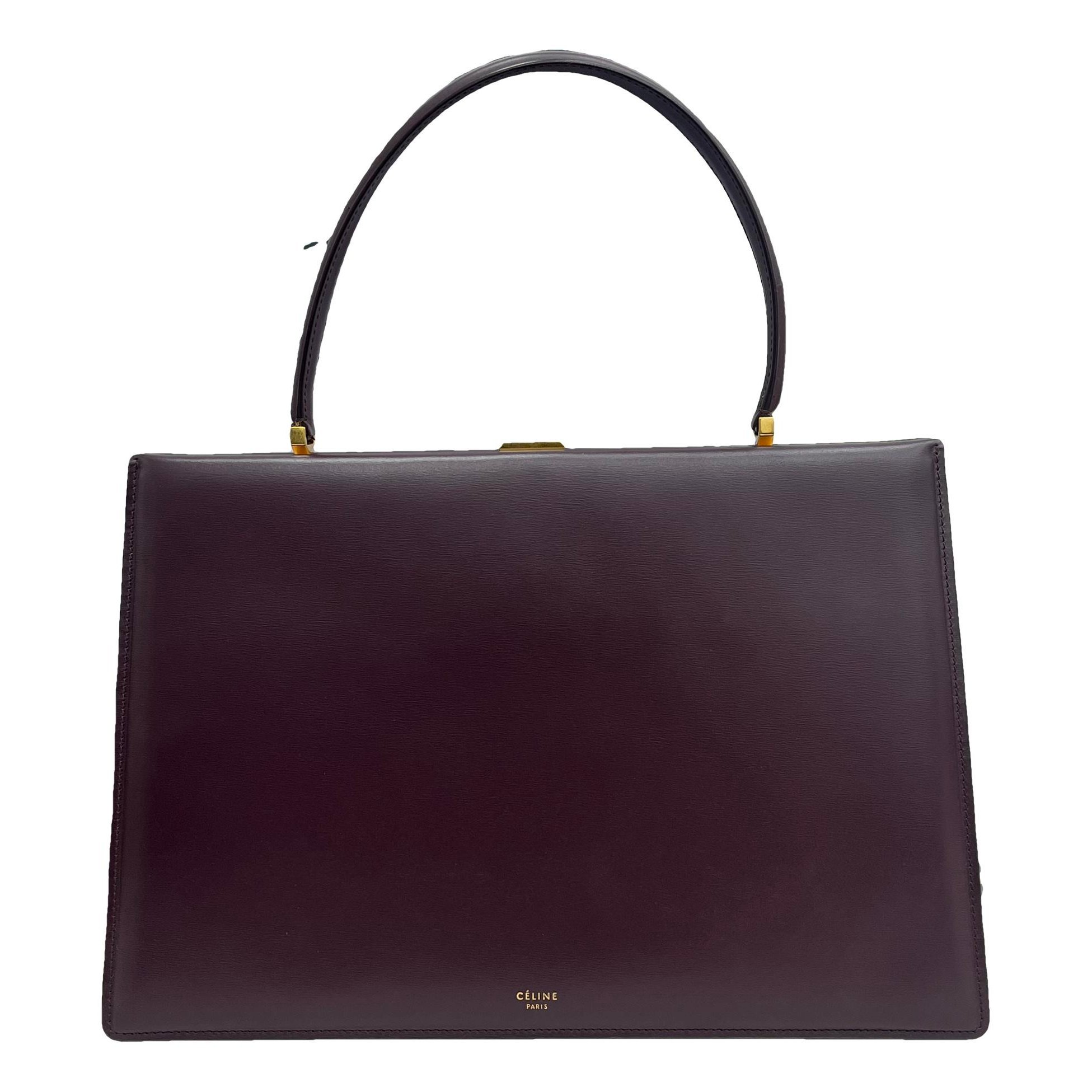 Clasp leather handbag