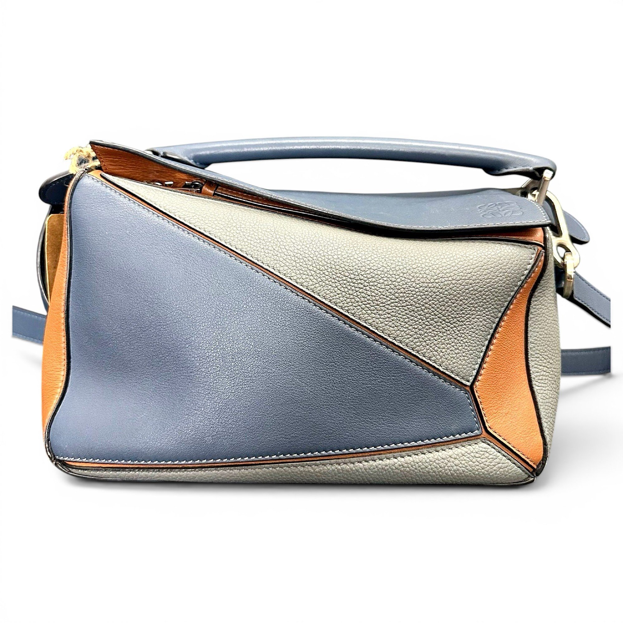 Puzzle leather handbag