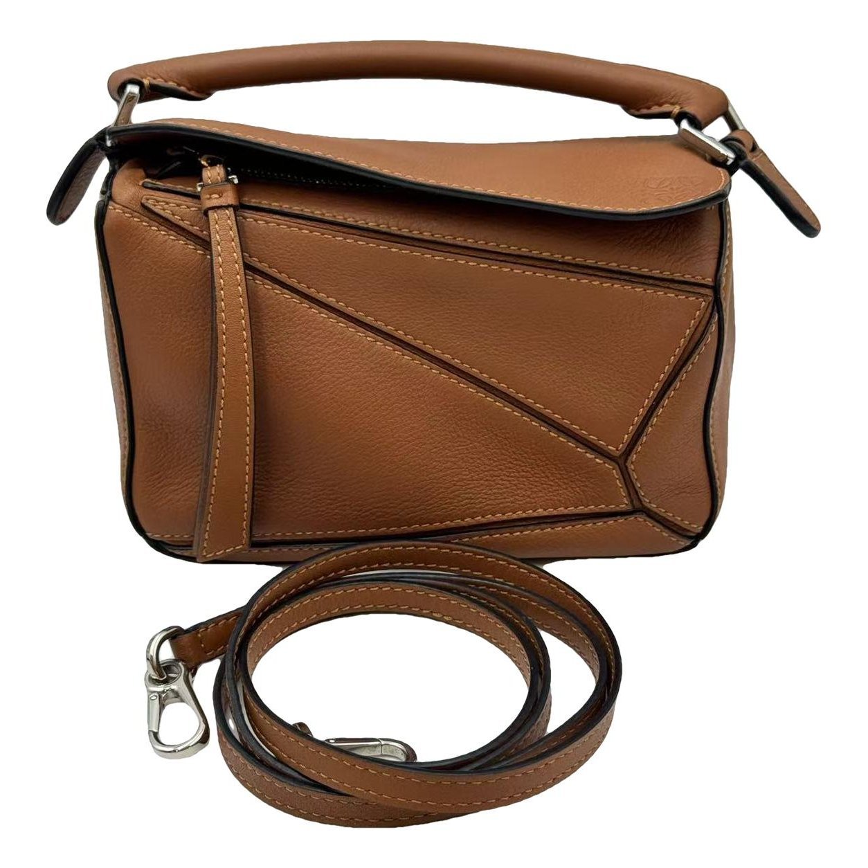 Puzzle leather handbag
