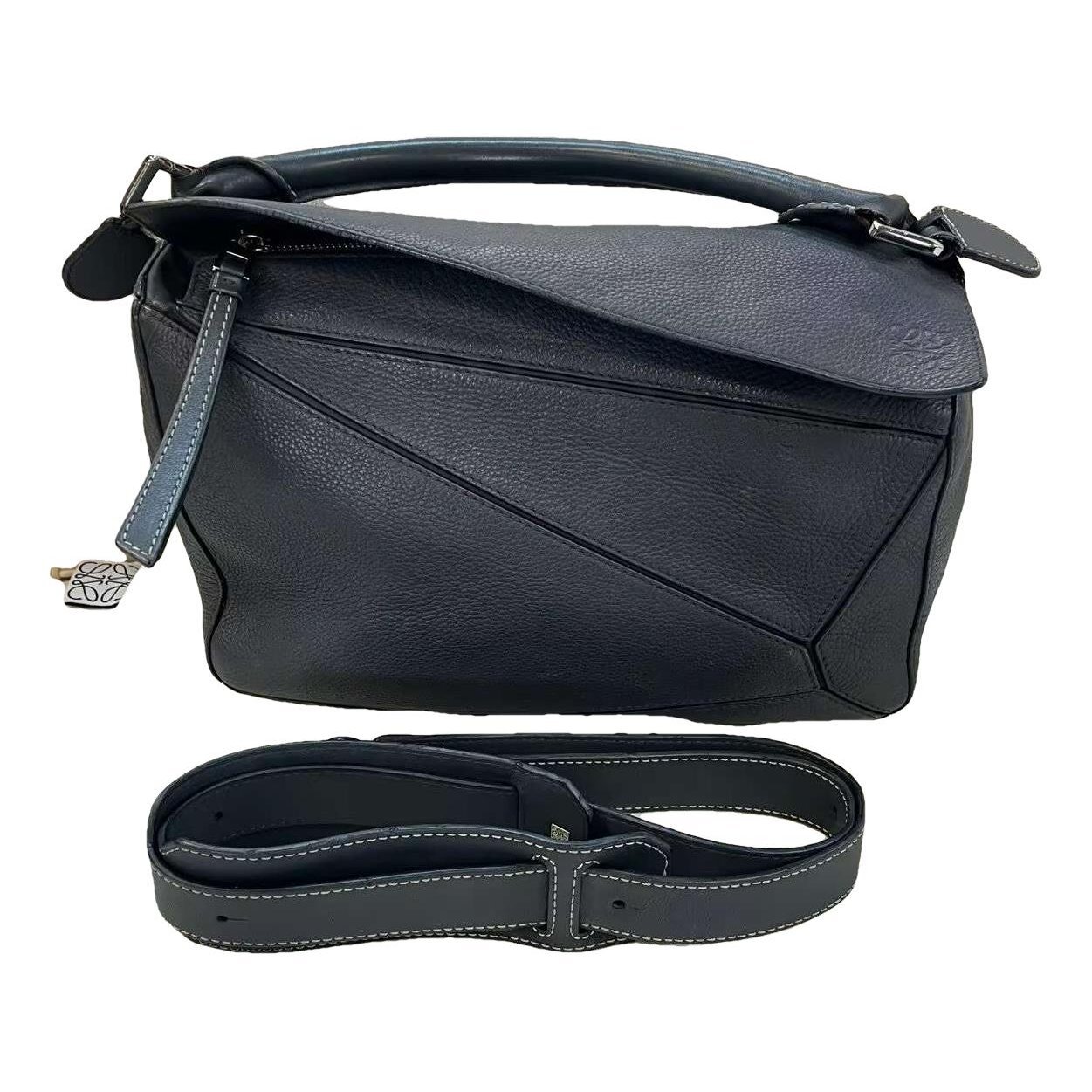 Puzzle leather handbag
