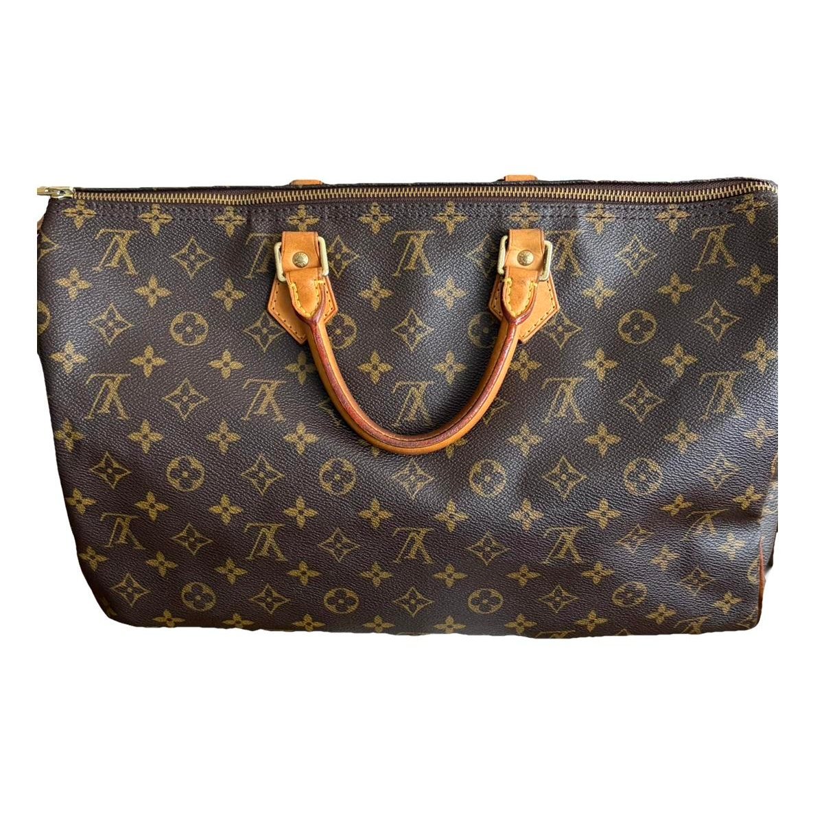Speedy patent leather handbag