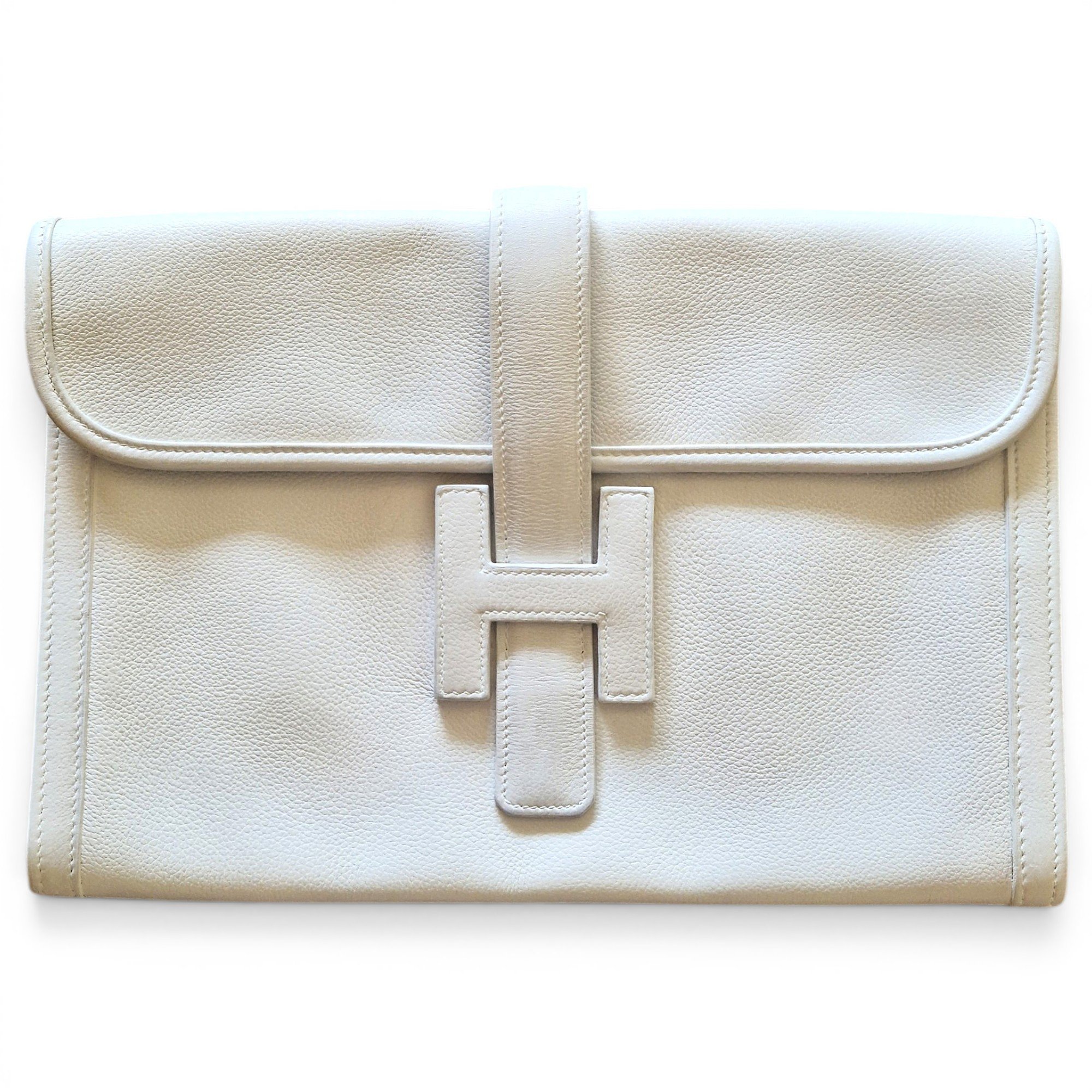 Jige leather clutch bag