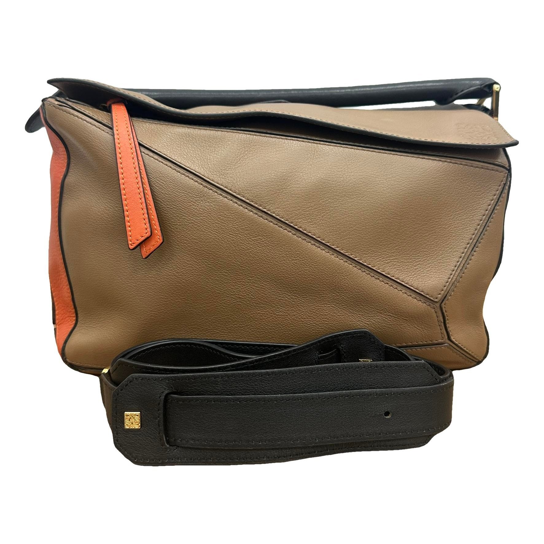 Puzzle leather handbag