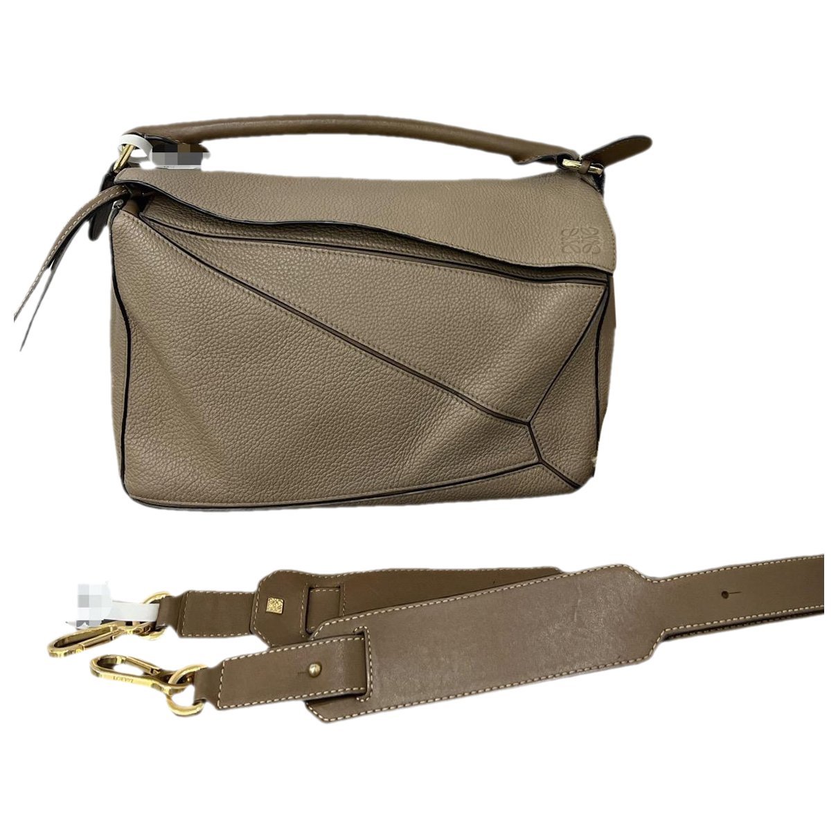 Puzzle leather handbag