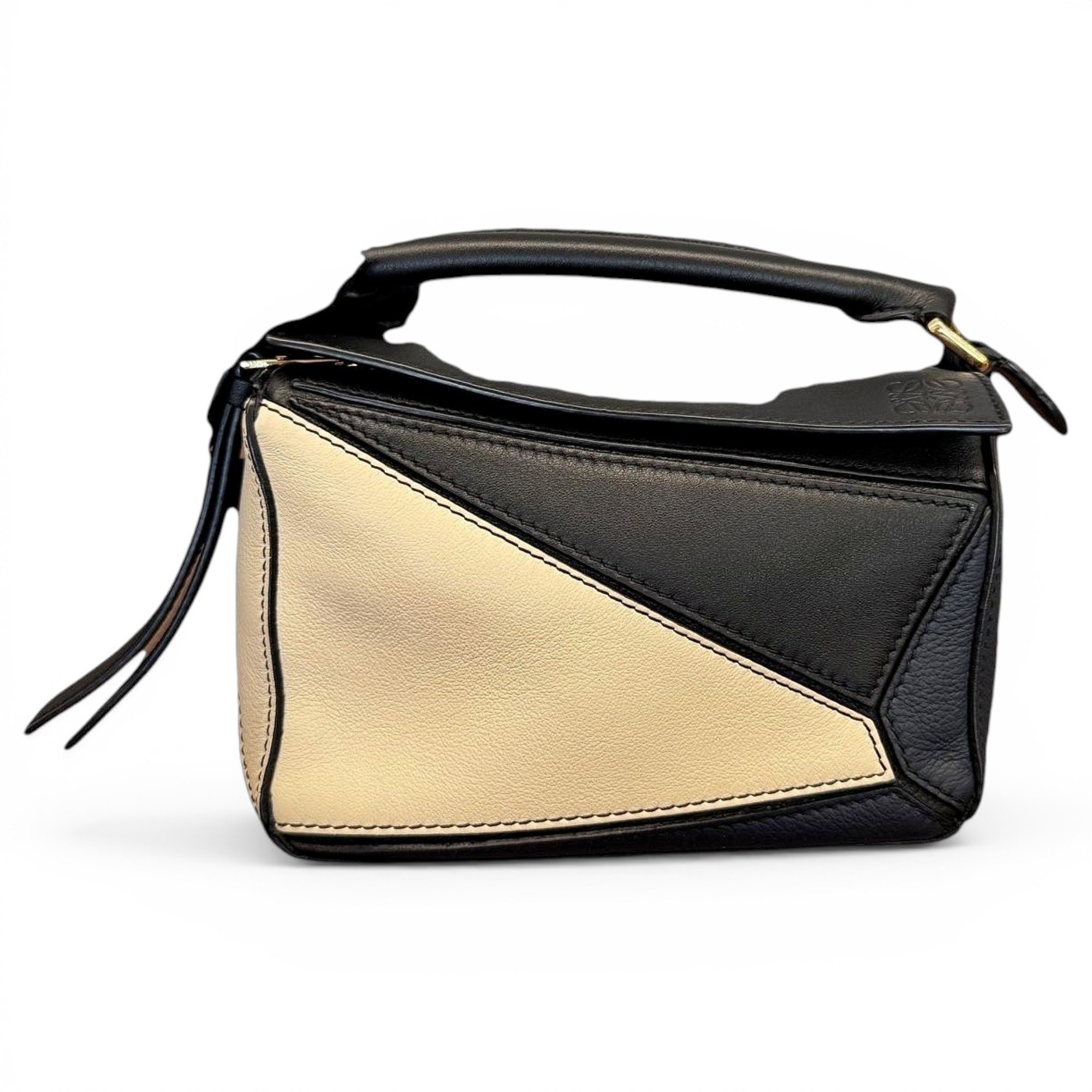 Puzzle leather handbag