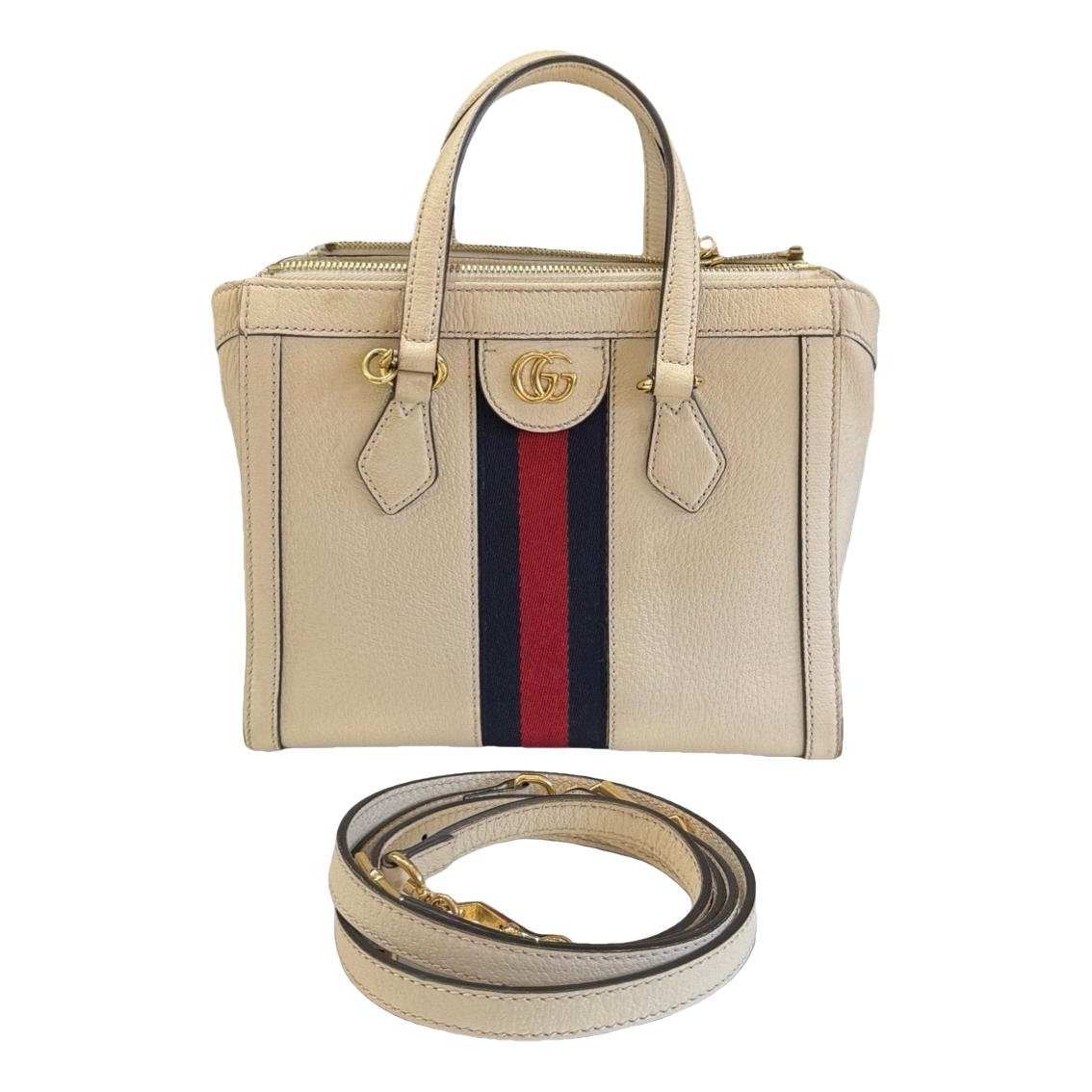 Ophidia Top Handle leather handbag