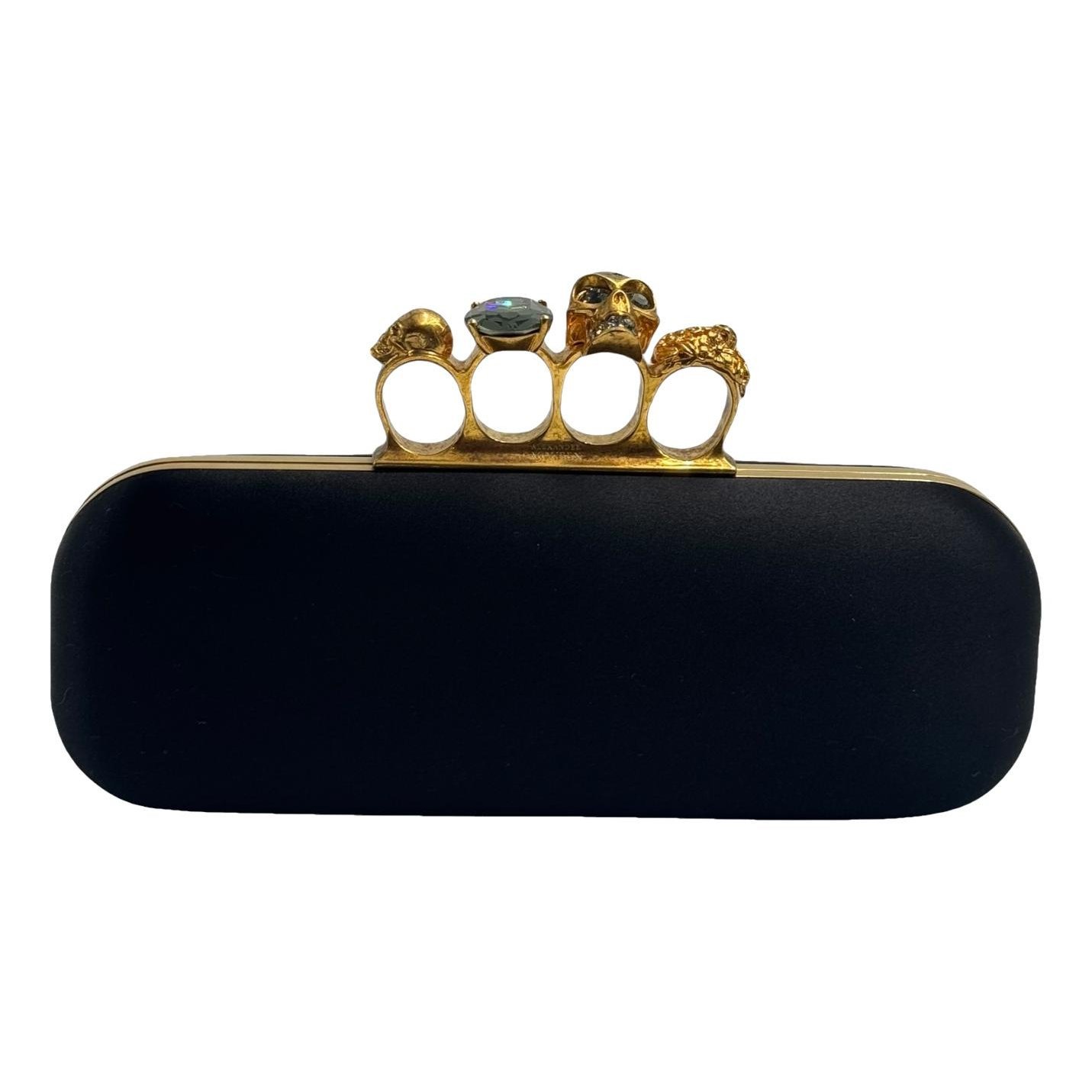 Knuckle cloth clutch bag