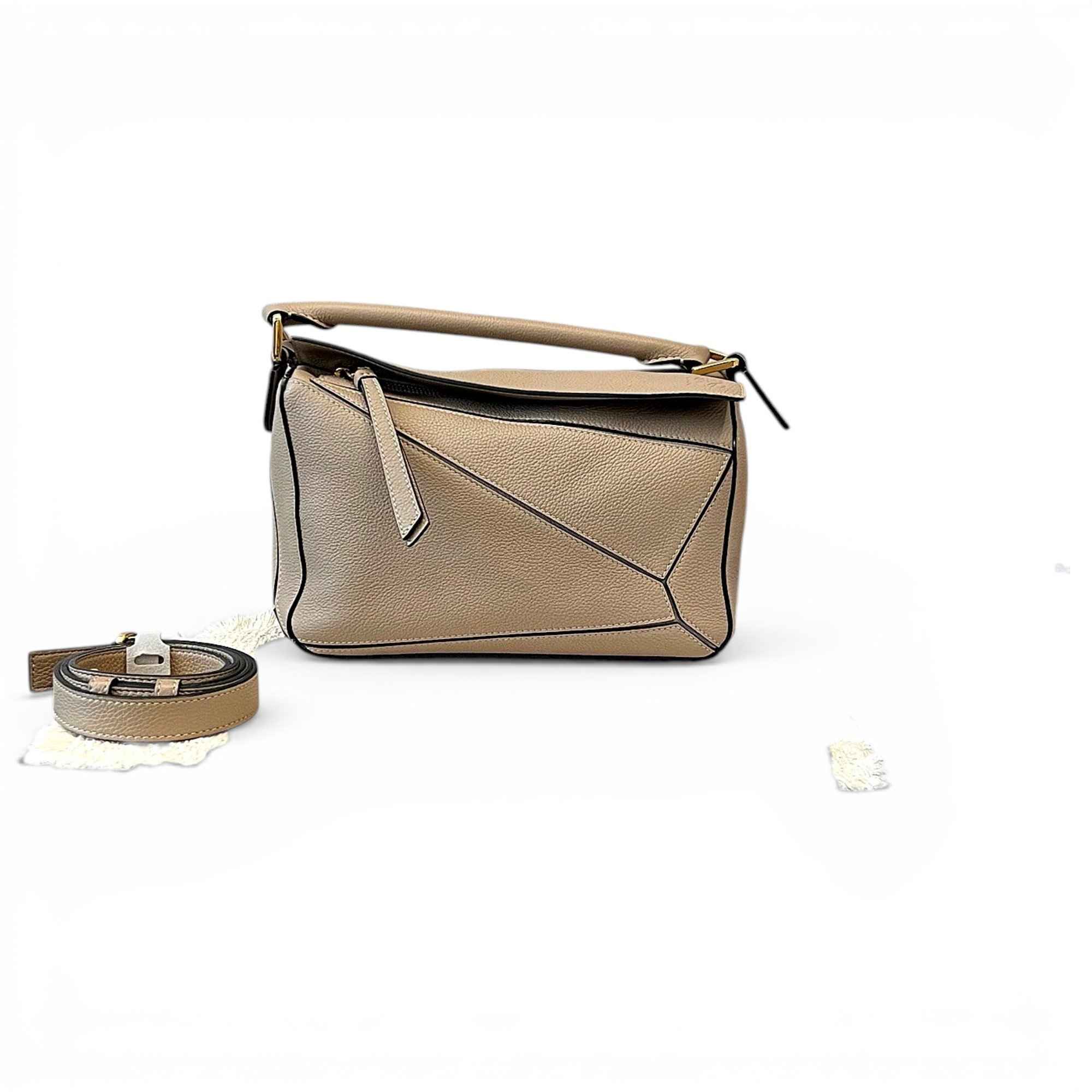 Puzzle leather handbag