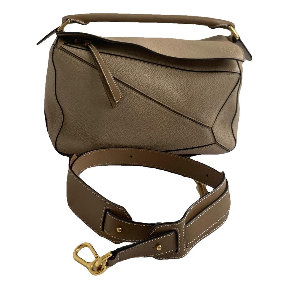 Puzzle leather handbag