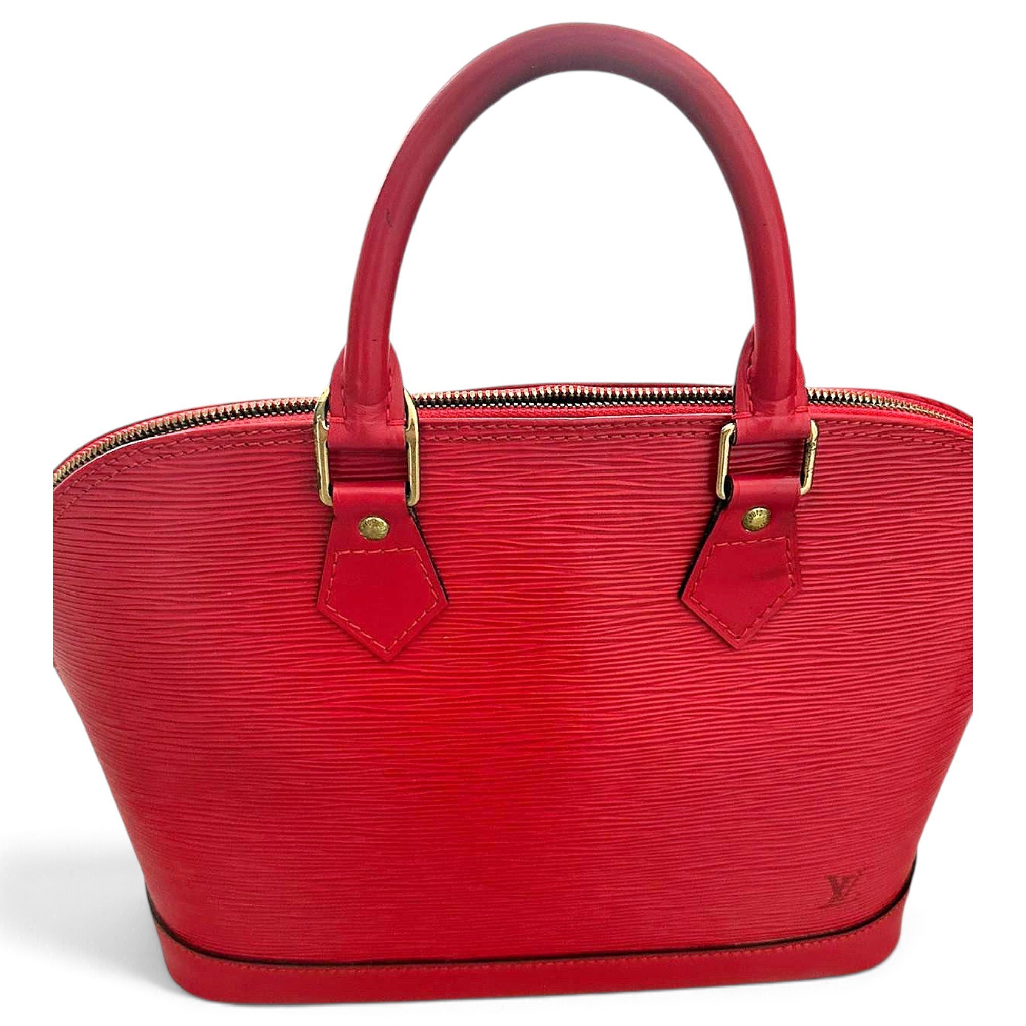 Louis Vuitton Alma leather handbag