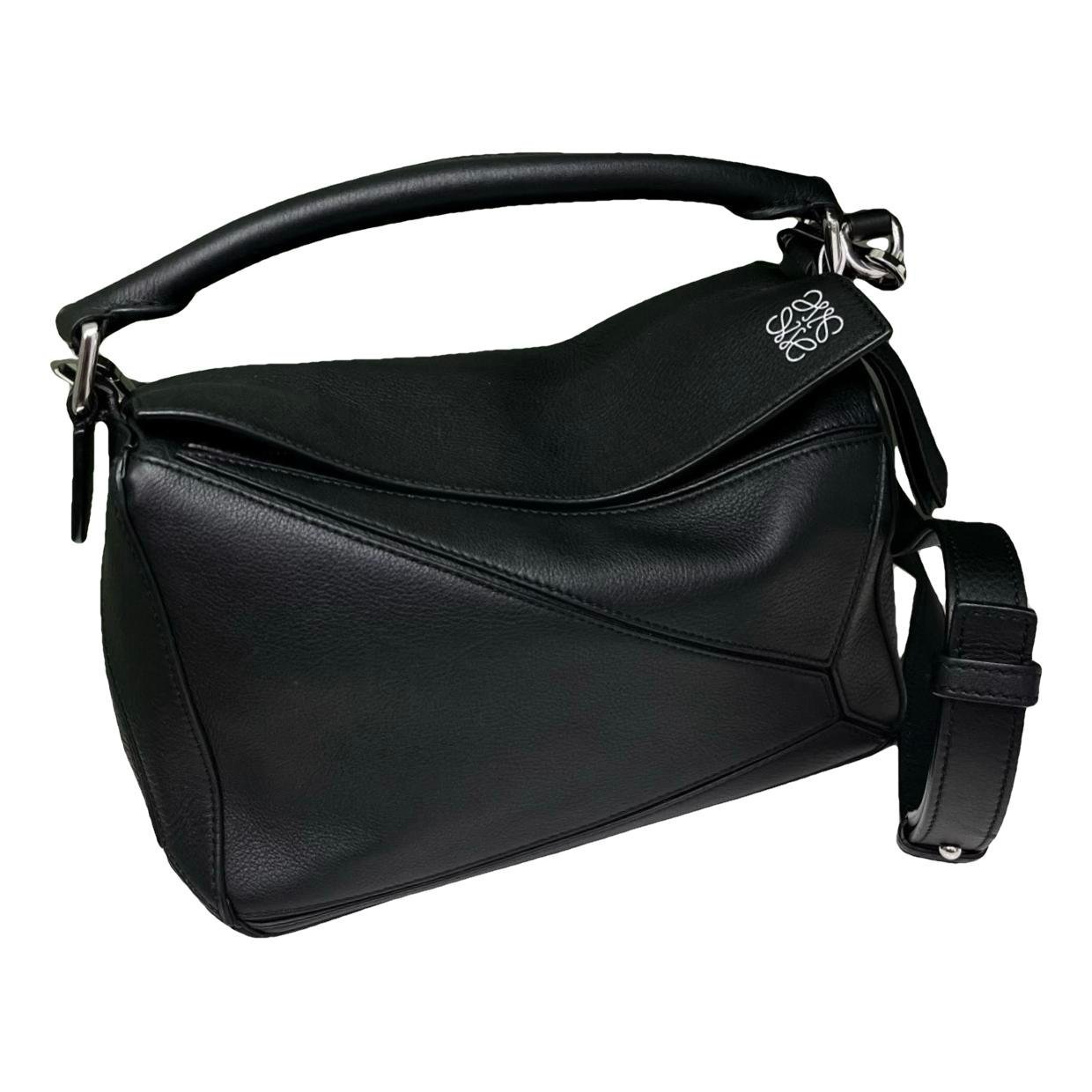 Puzzle leather handbag
