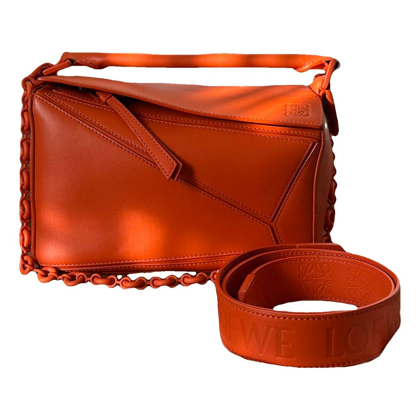 Puzzle leather handbag