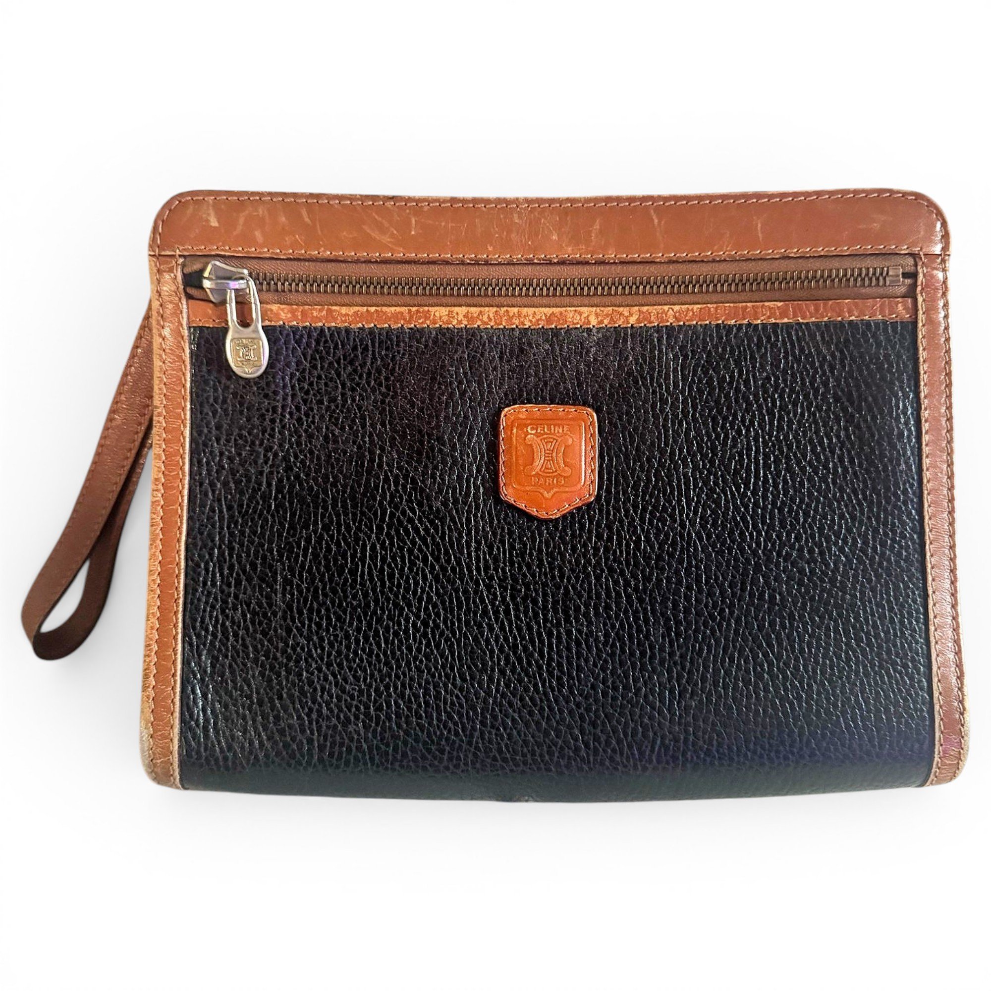 Triomphe Vintage leather clutch bag