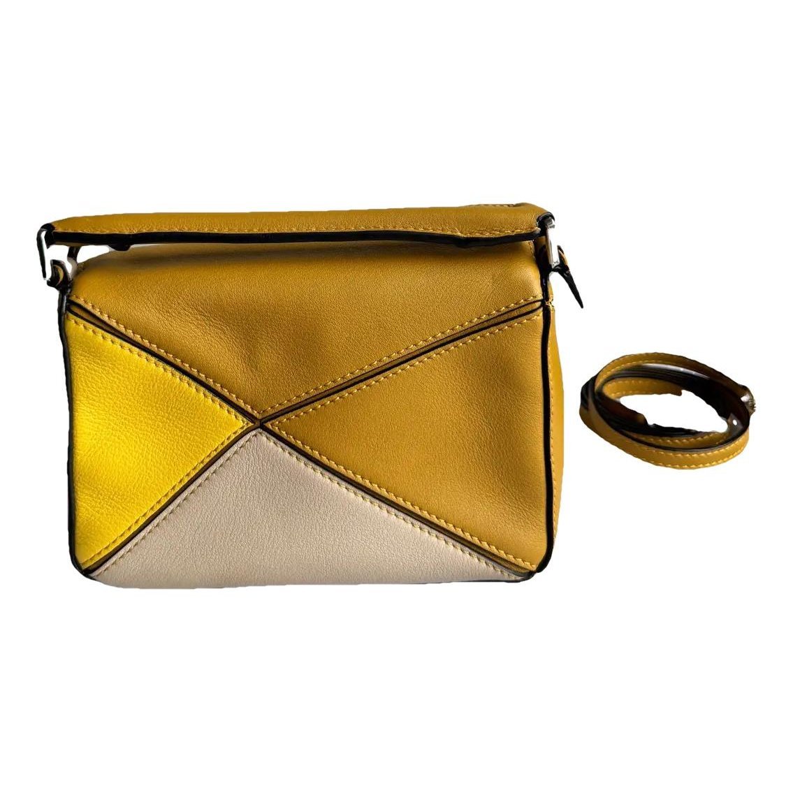 Puzzle leather handbag