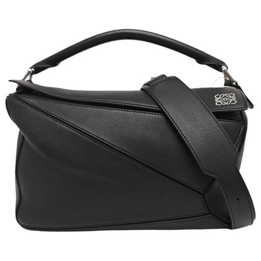 Puzzle leather handbag