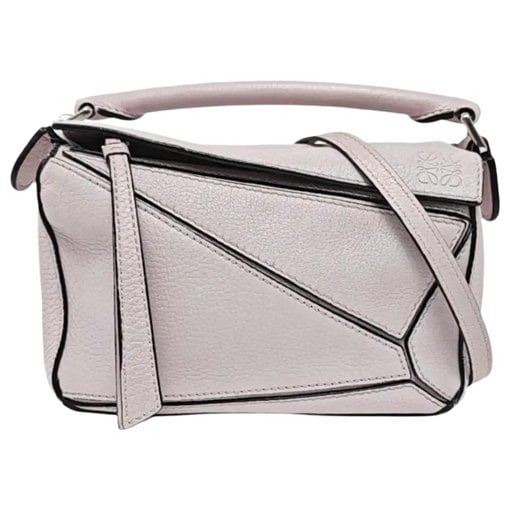 Puzzle leather handbag