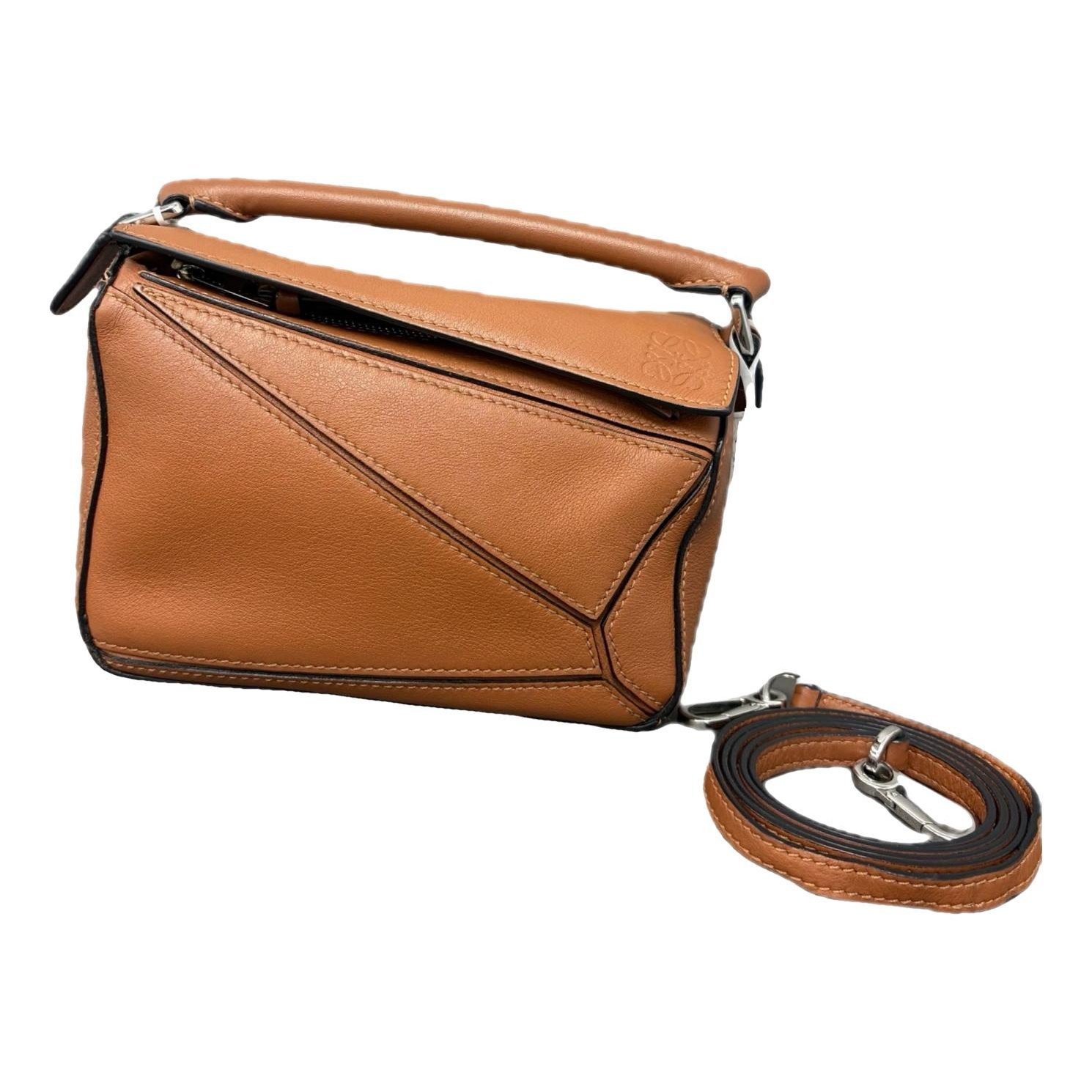 Puzzle leather handbag