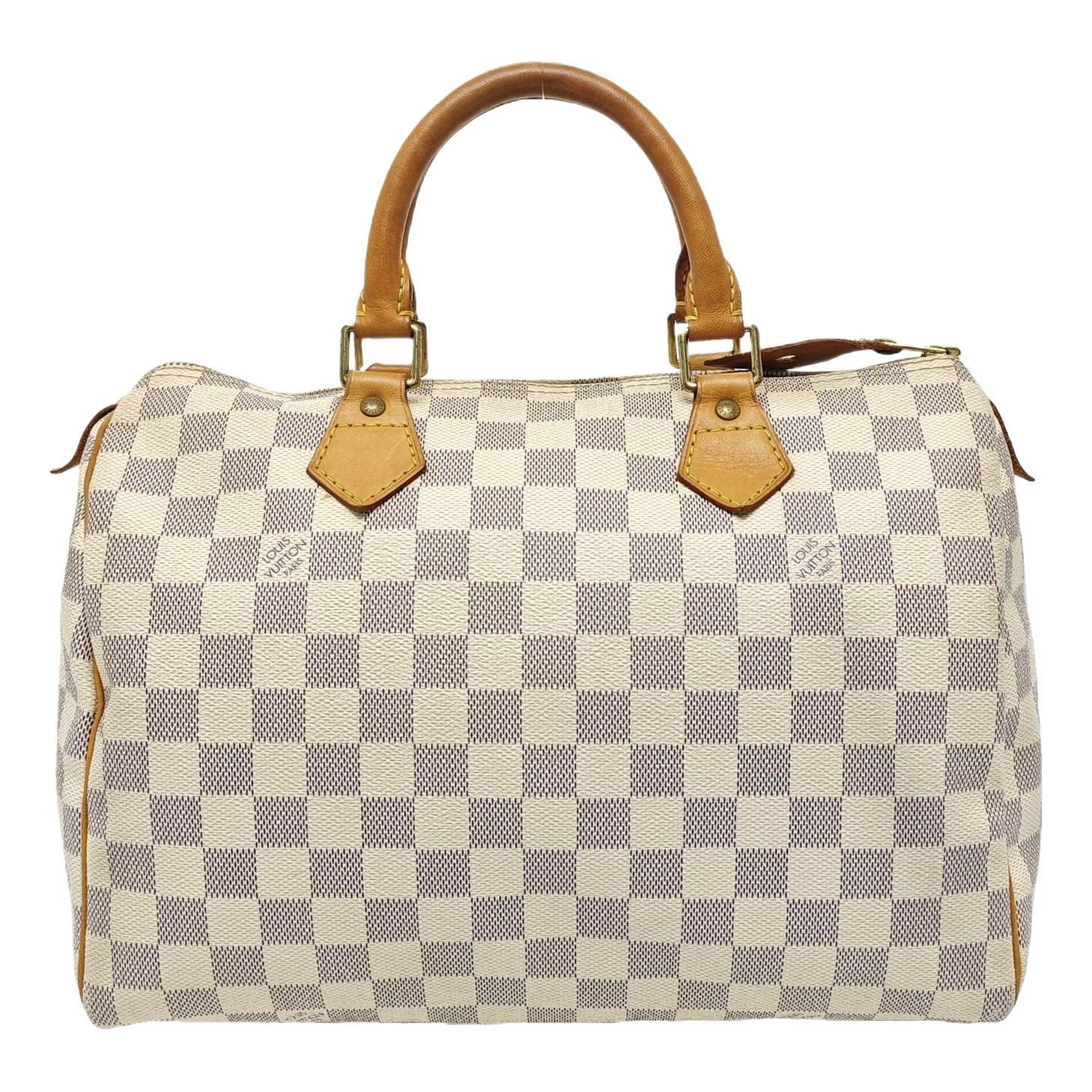 Nano Speedy / Mini HL leather handbag