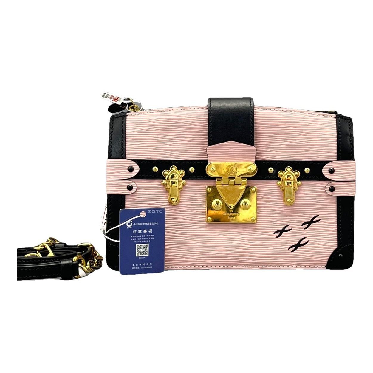 Pochette Trunk leather handbag