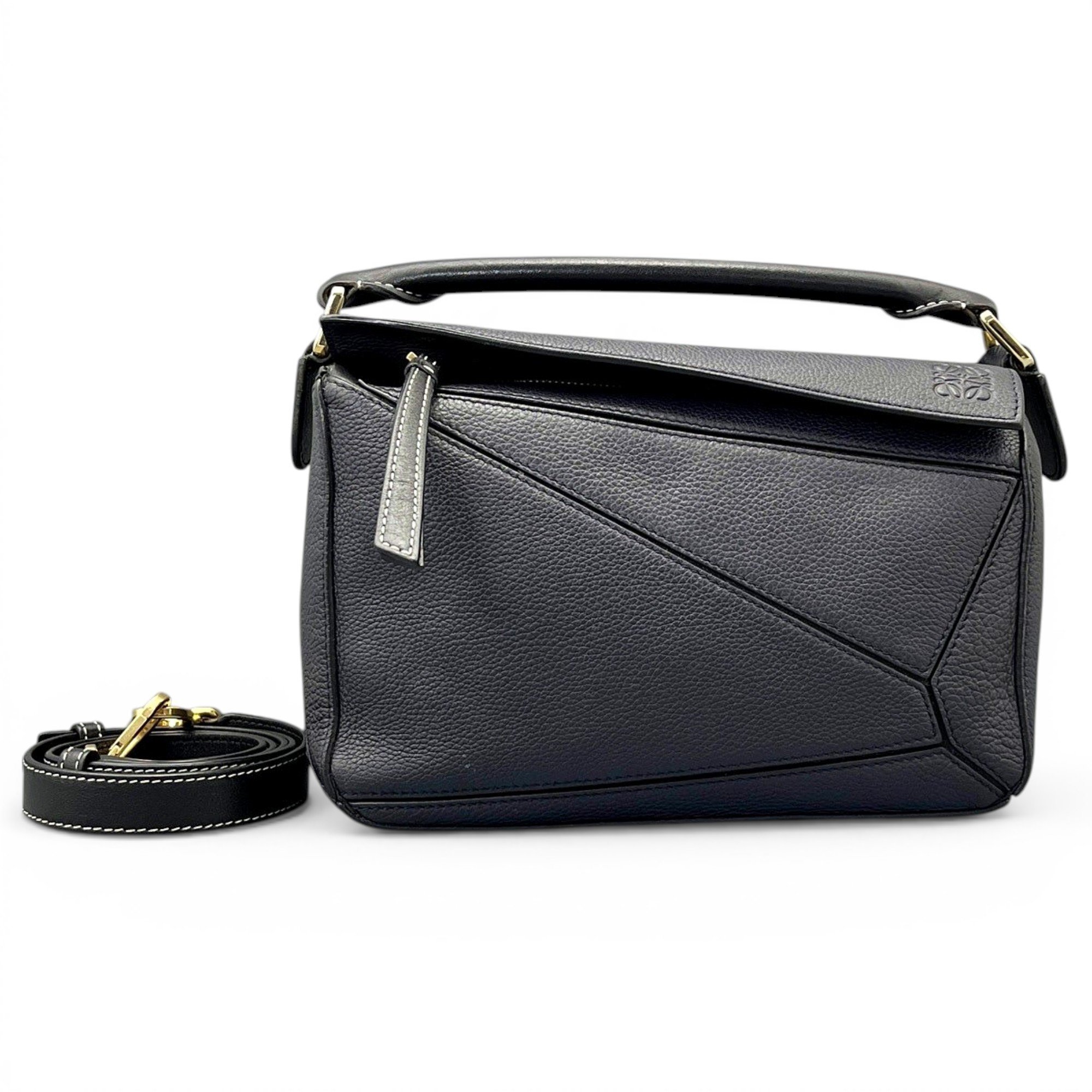 Puzzle leather handbag