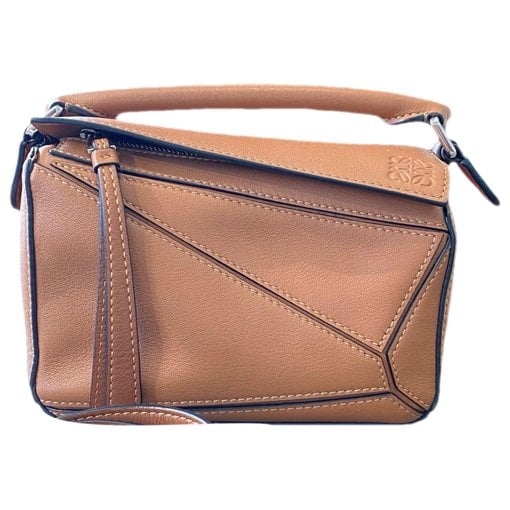 Puzzle leather handbag