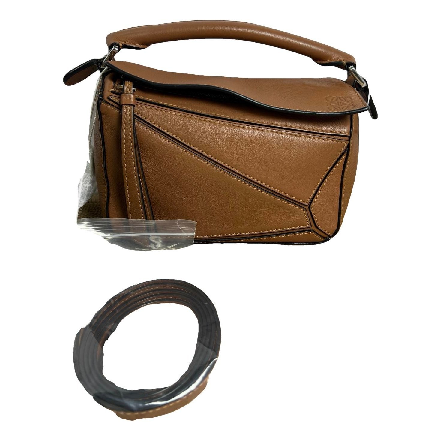 Puzzle leather handbag