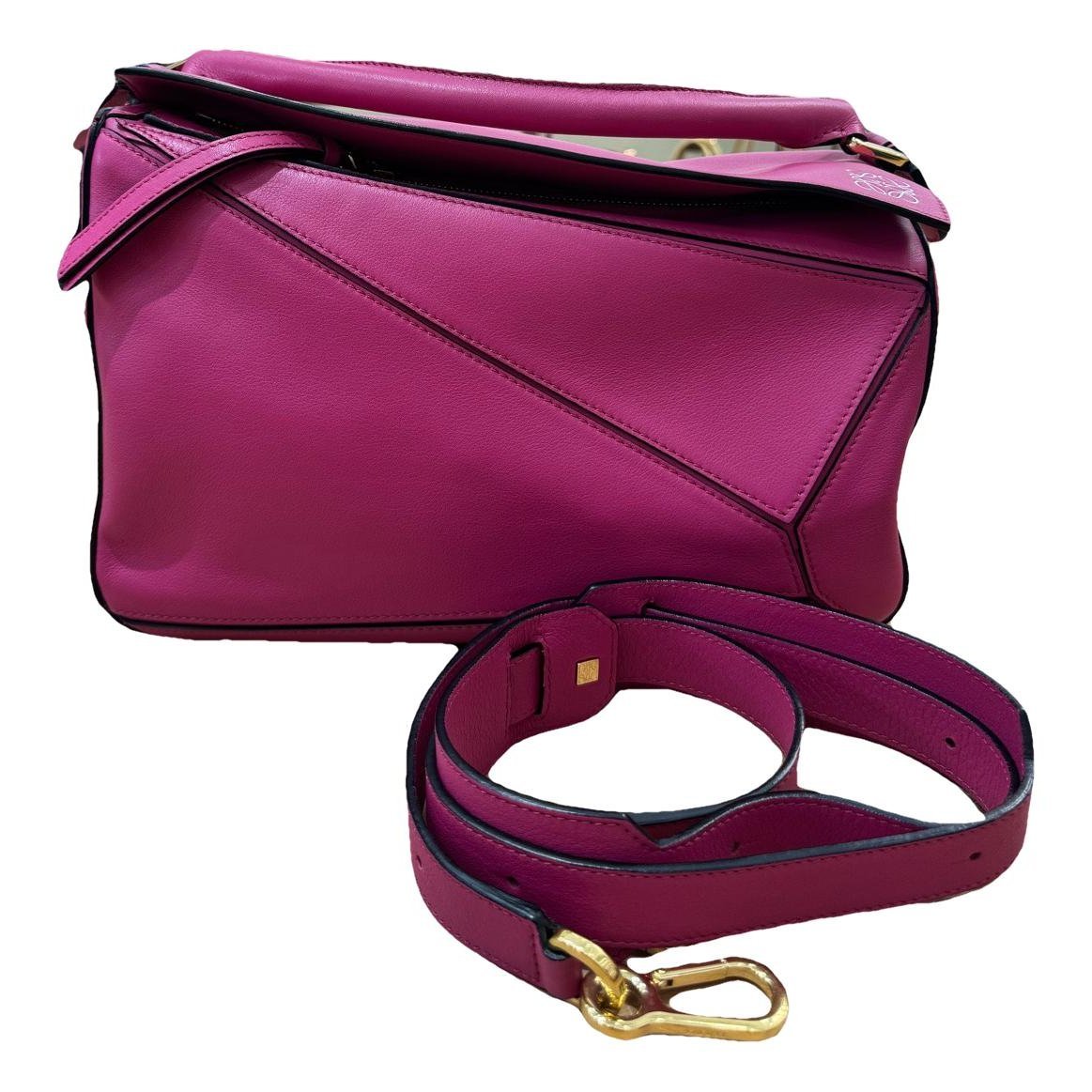 Puzzle leather handbag