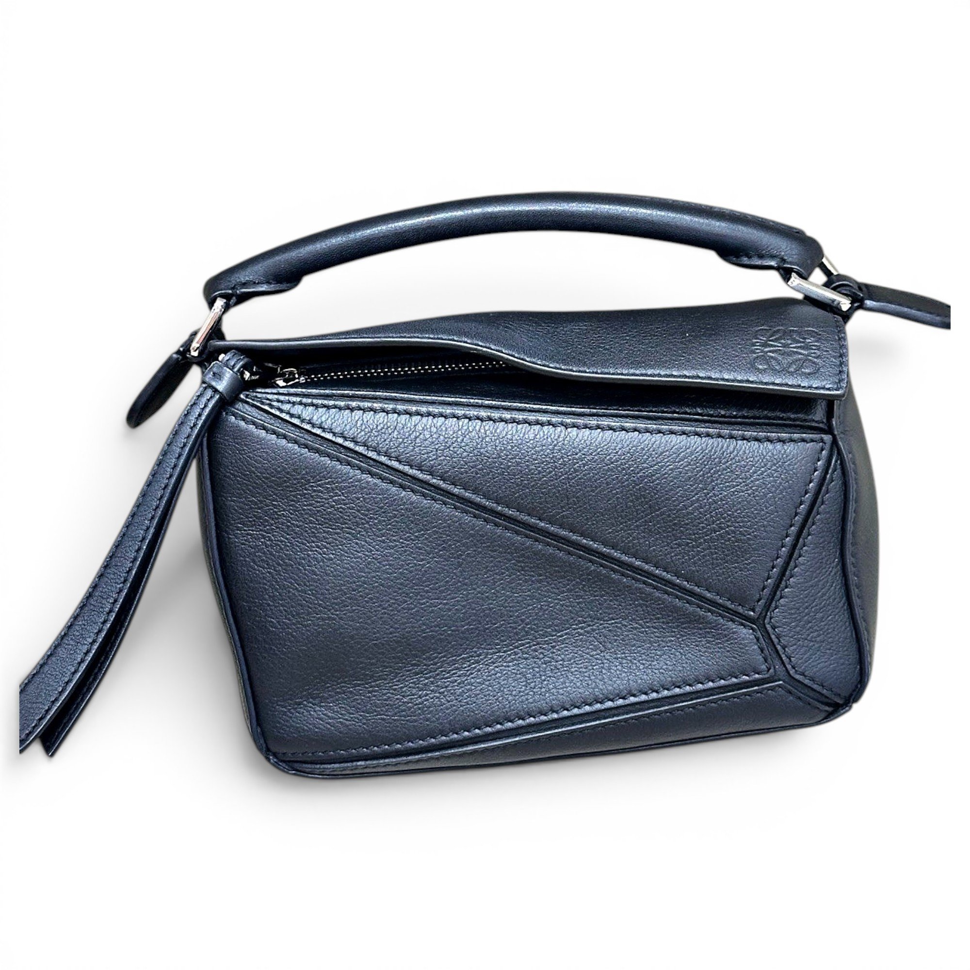 Puzzle leather handbag