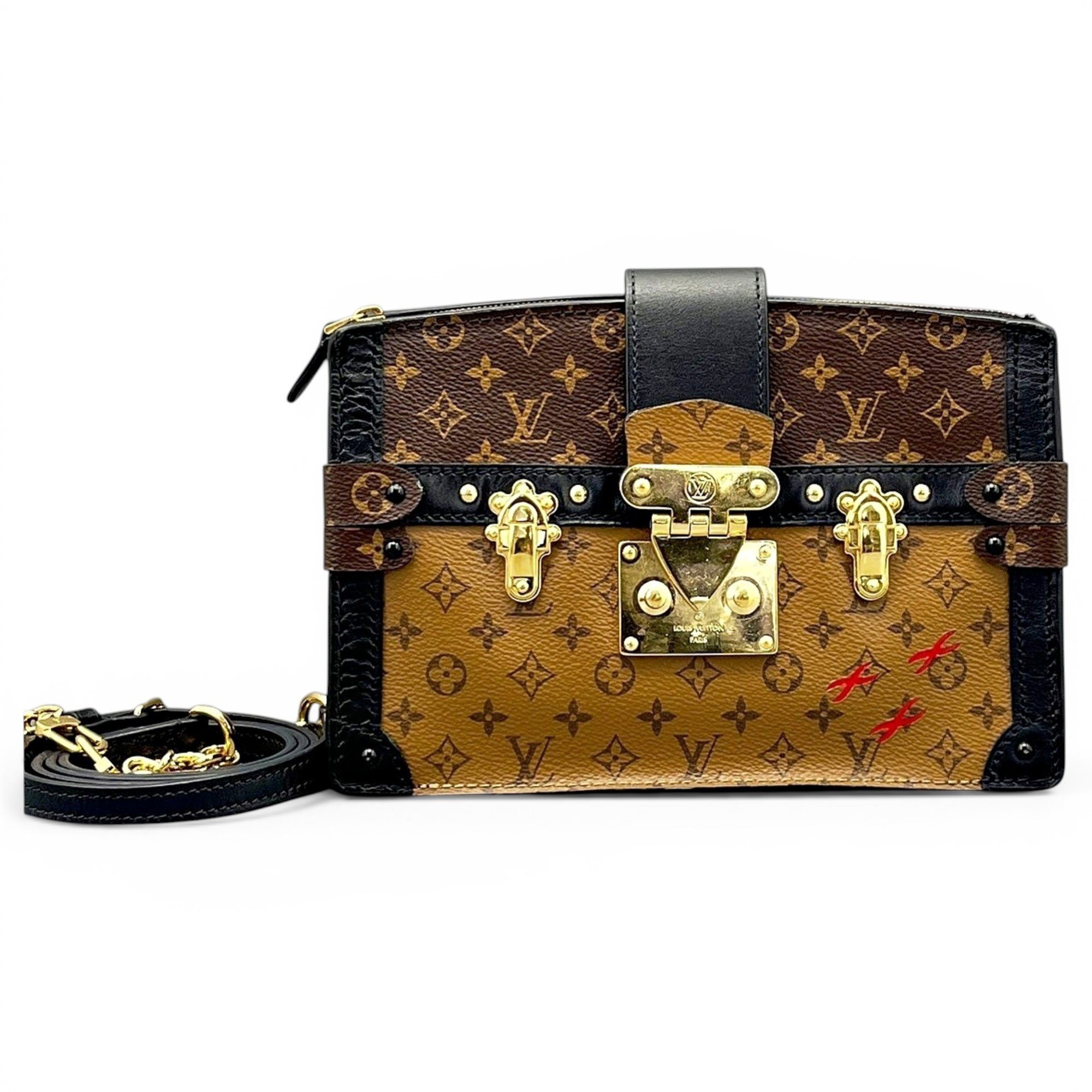 Pochette Trunk leather handbag