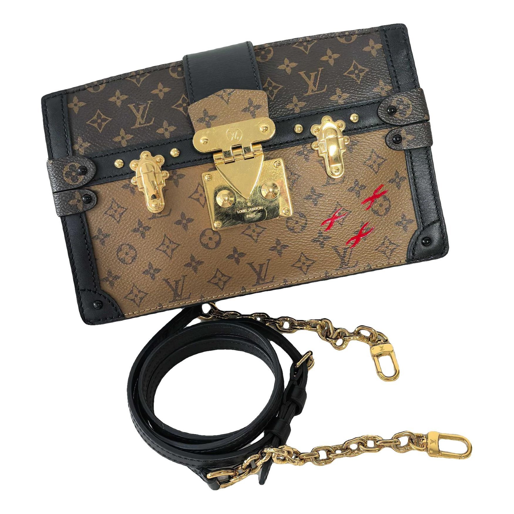 Pochette Trunk leather handbag
