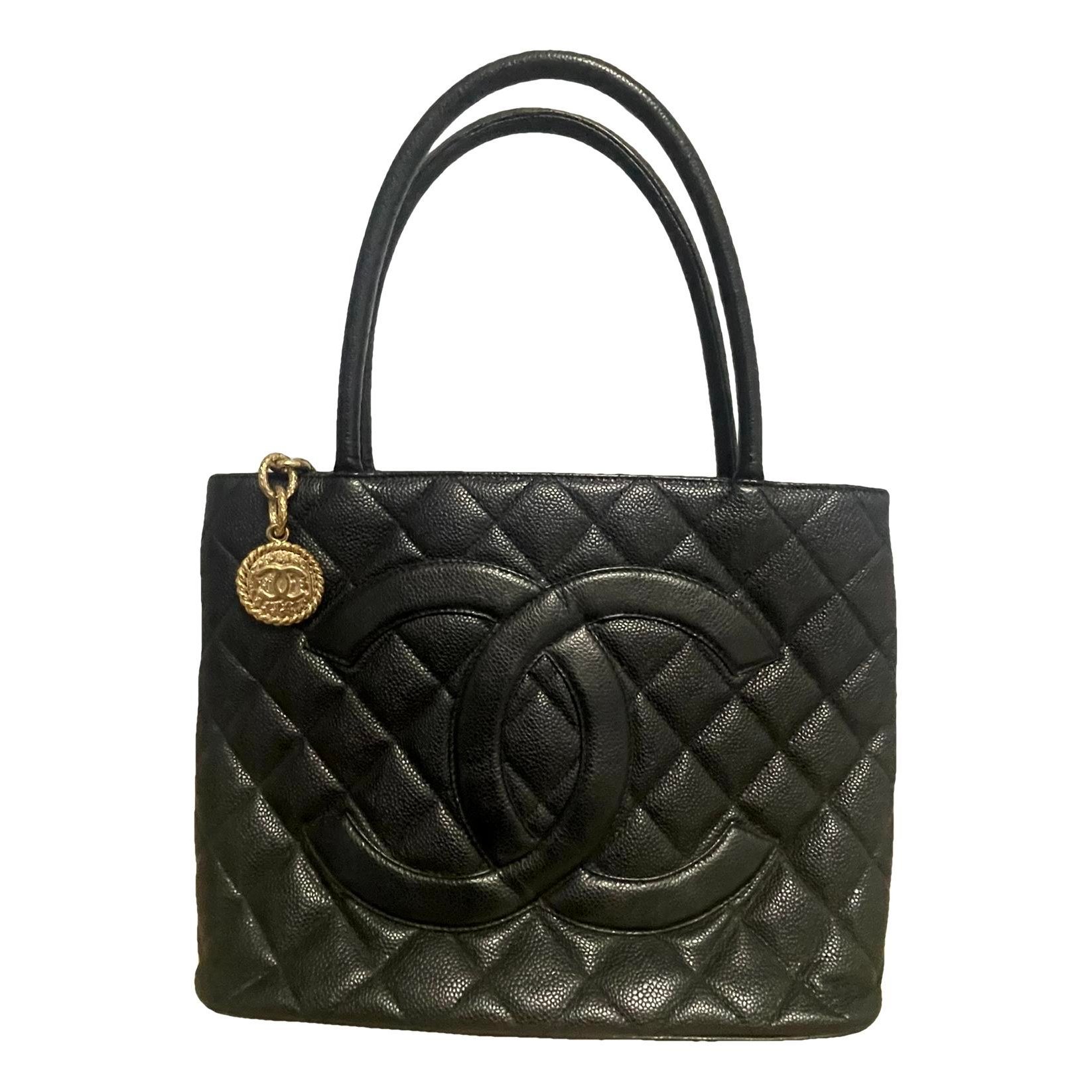Médaillon leather handbag