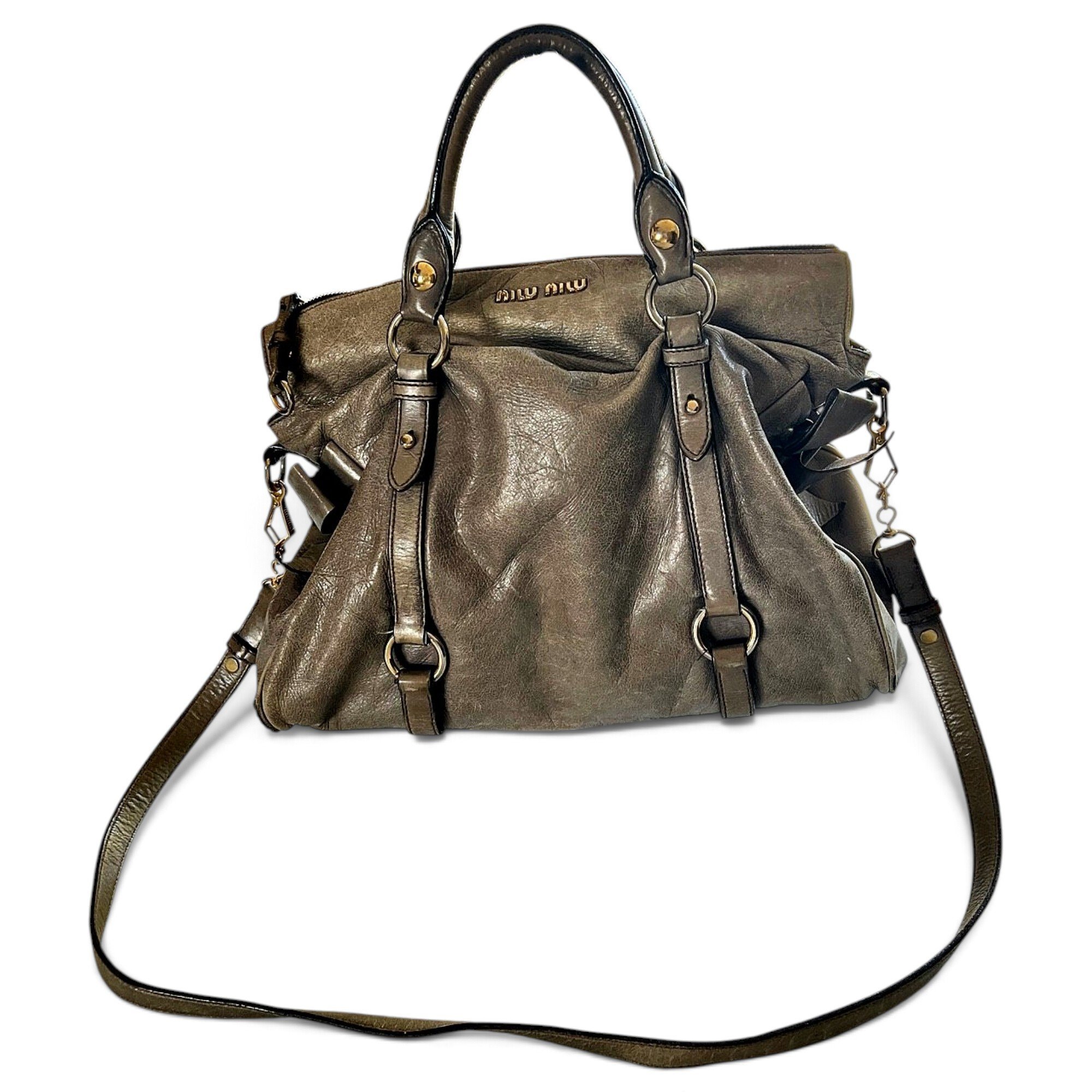 Bow bag leather handbag