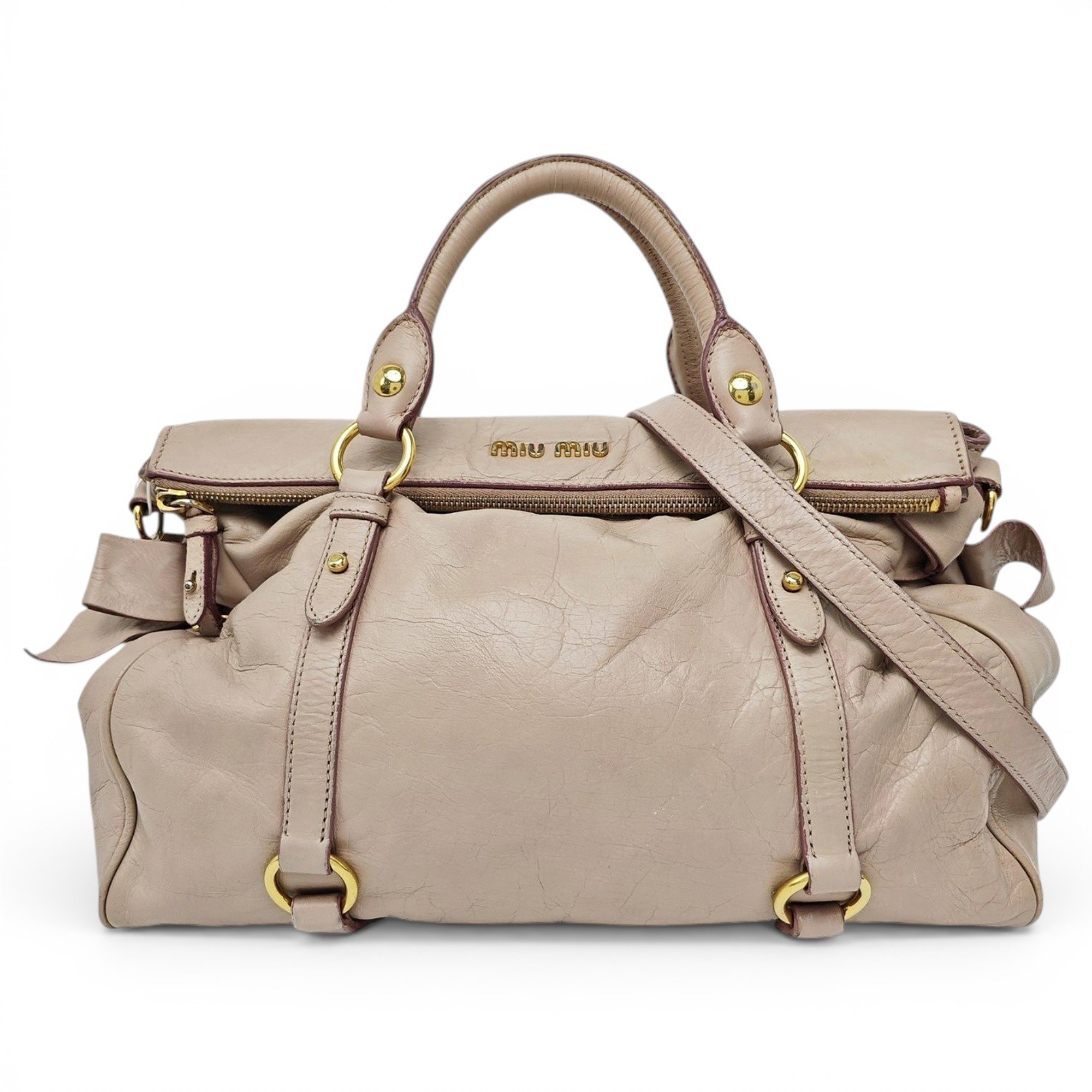 Bow bag leather handbag