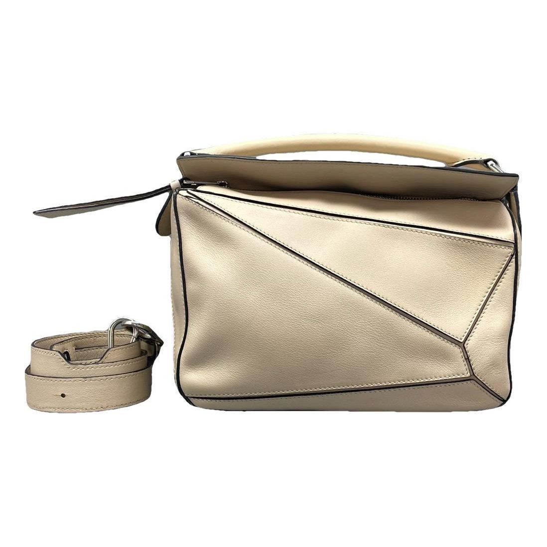 Puzzle leather handbag