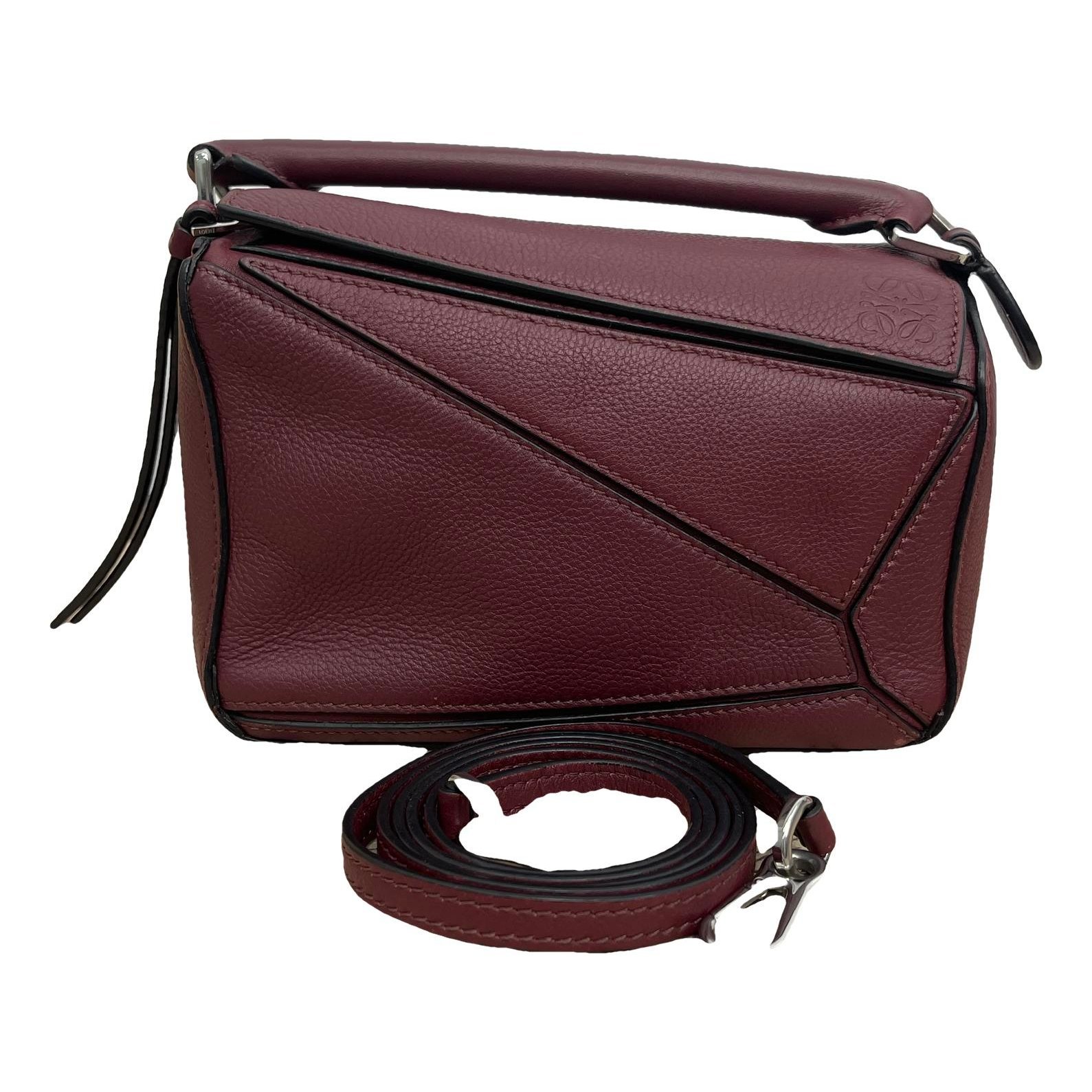 Puzzle leather handbag