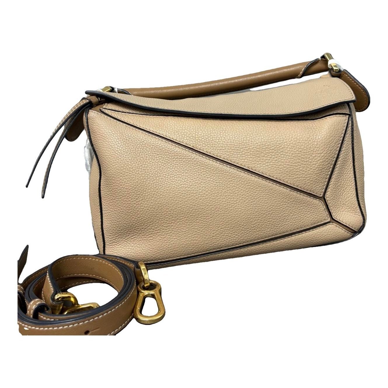 Puzzle leather handbag