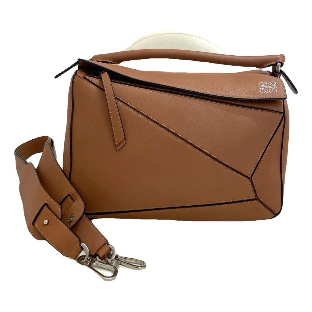 Puzzle leather handbag
