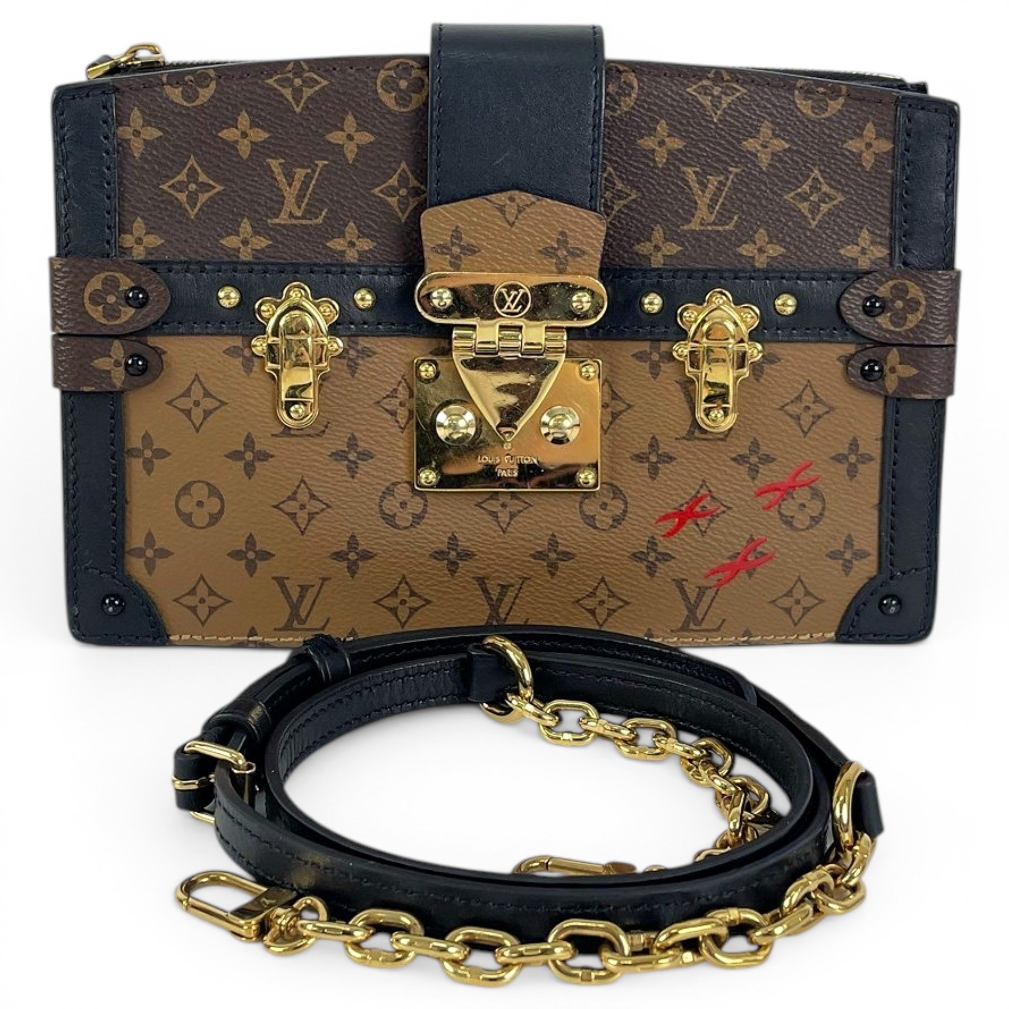 Pochette Trunk leather handbag